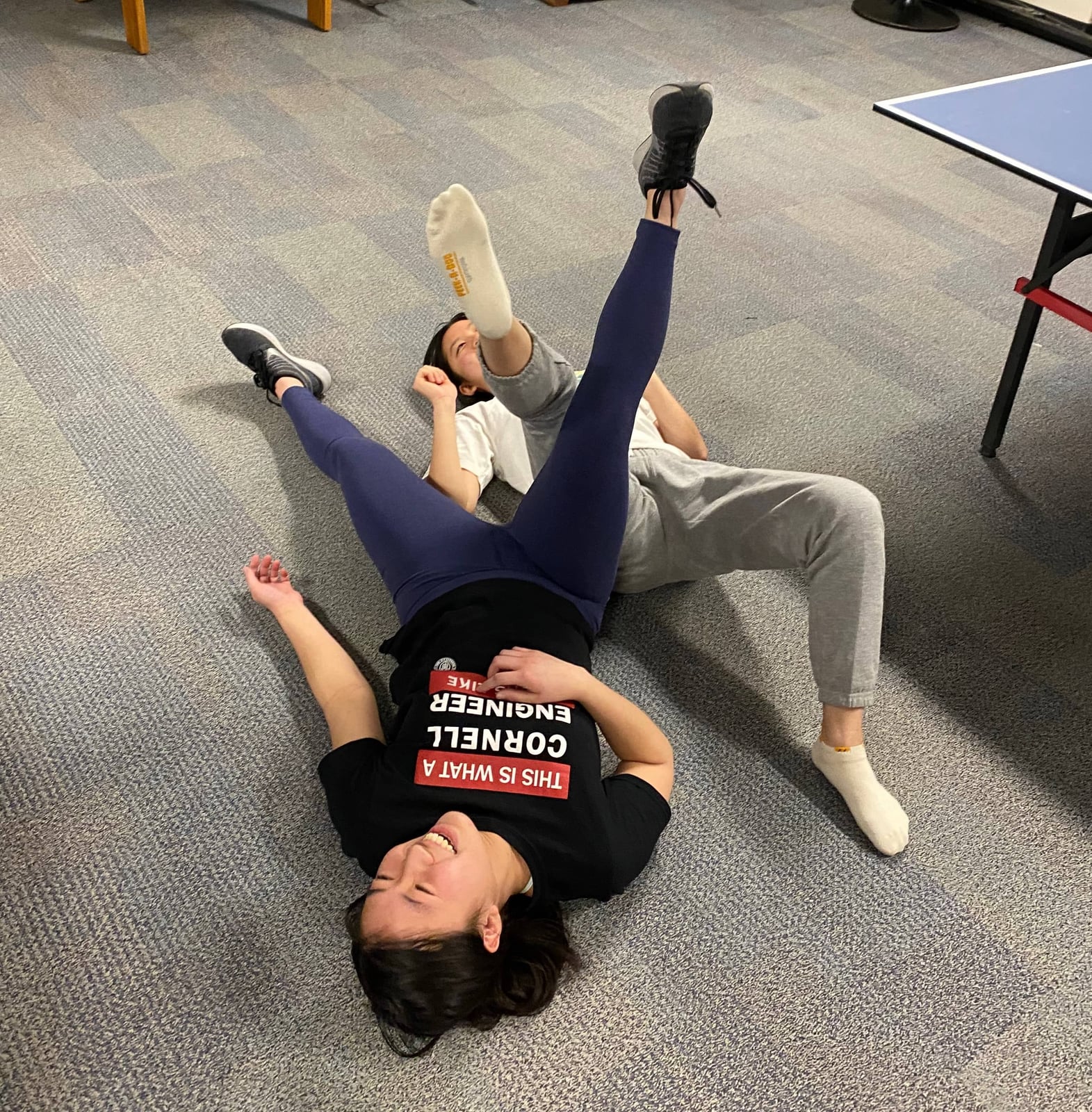 Grace and Elisabeth wrestle with their legs