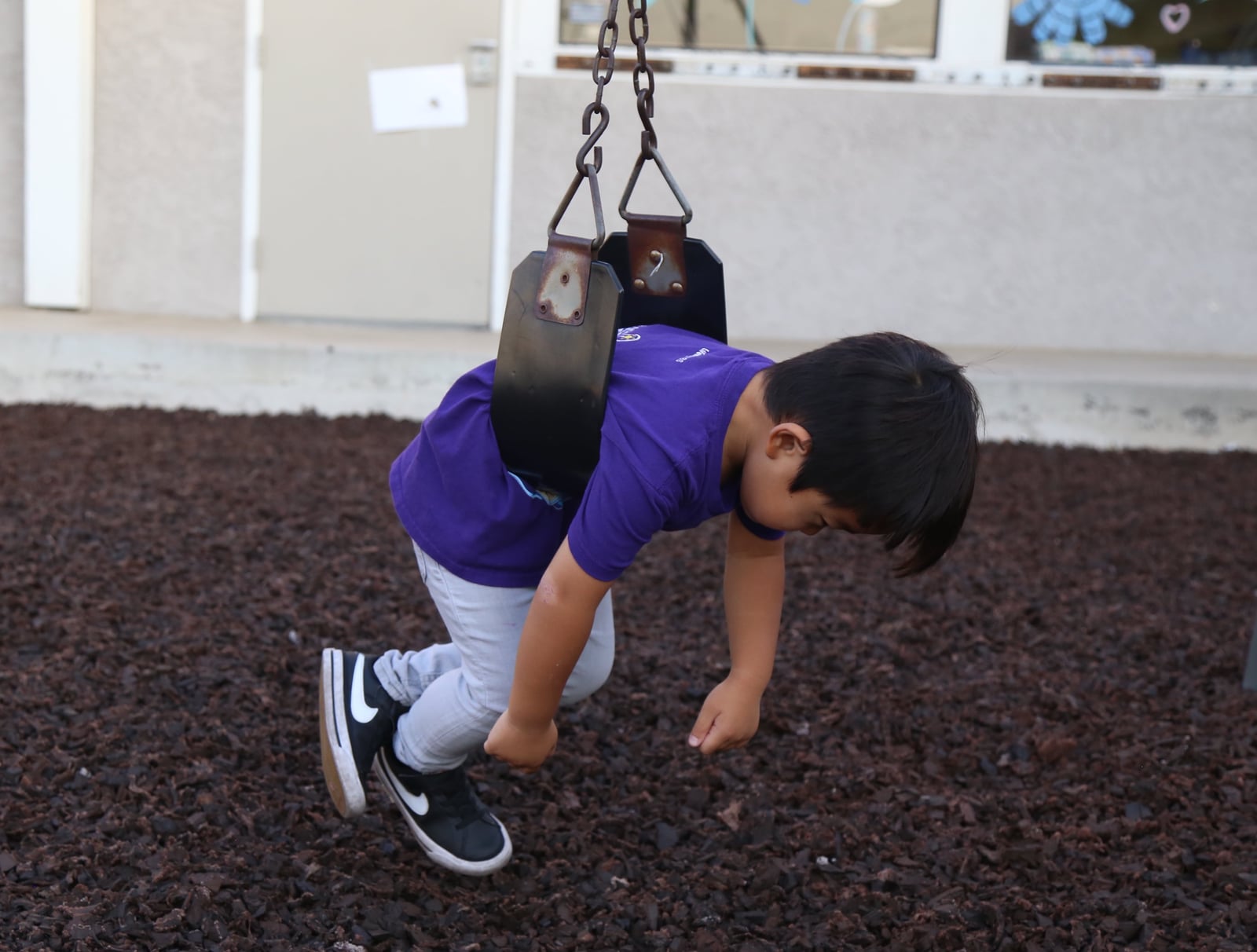 Charles on a swing.