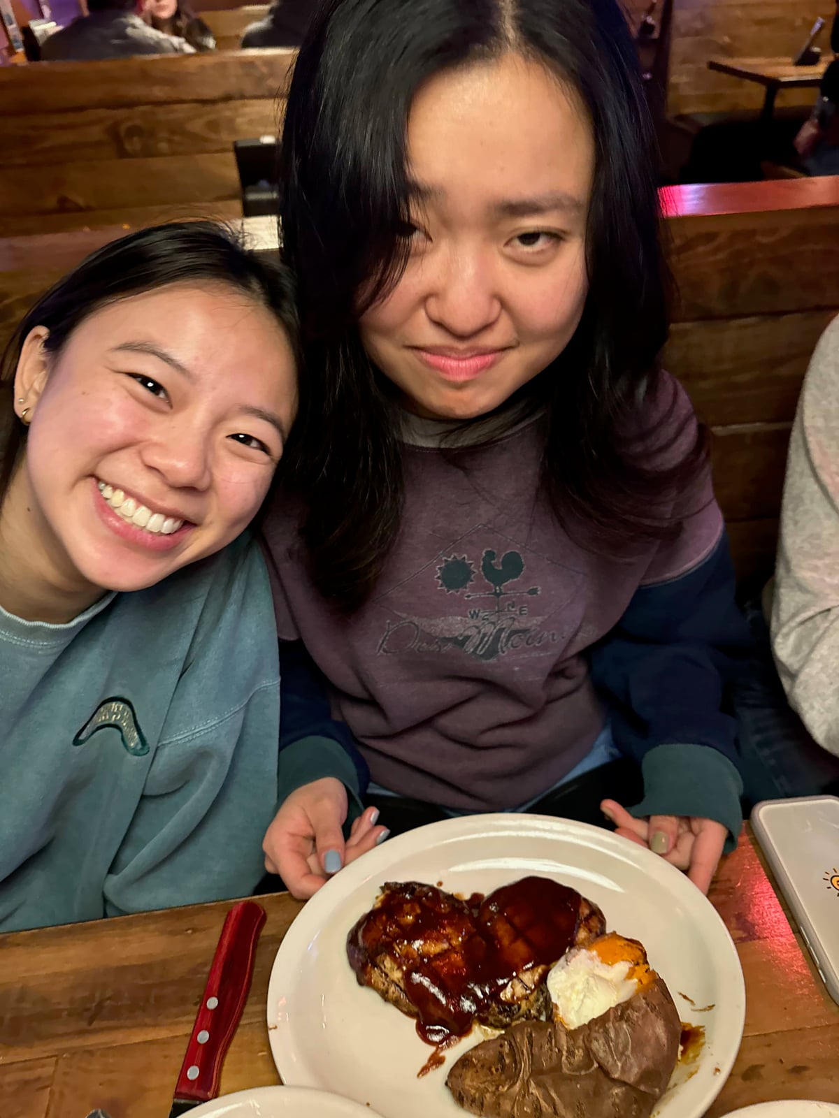 Aleena orders chicken at a steak restaurant