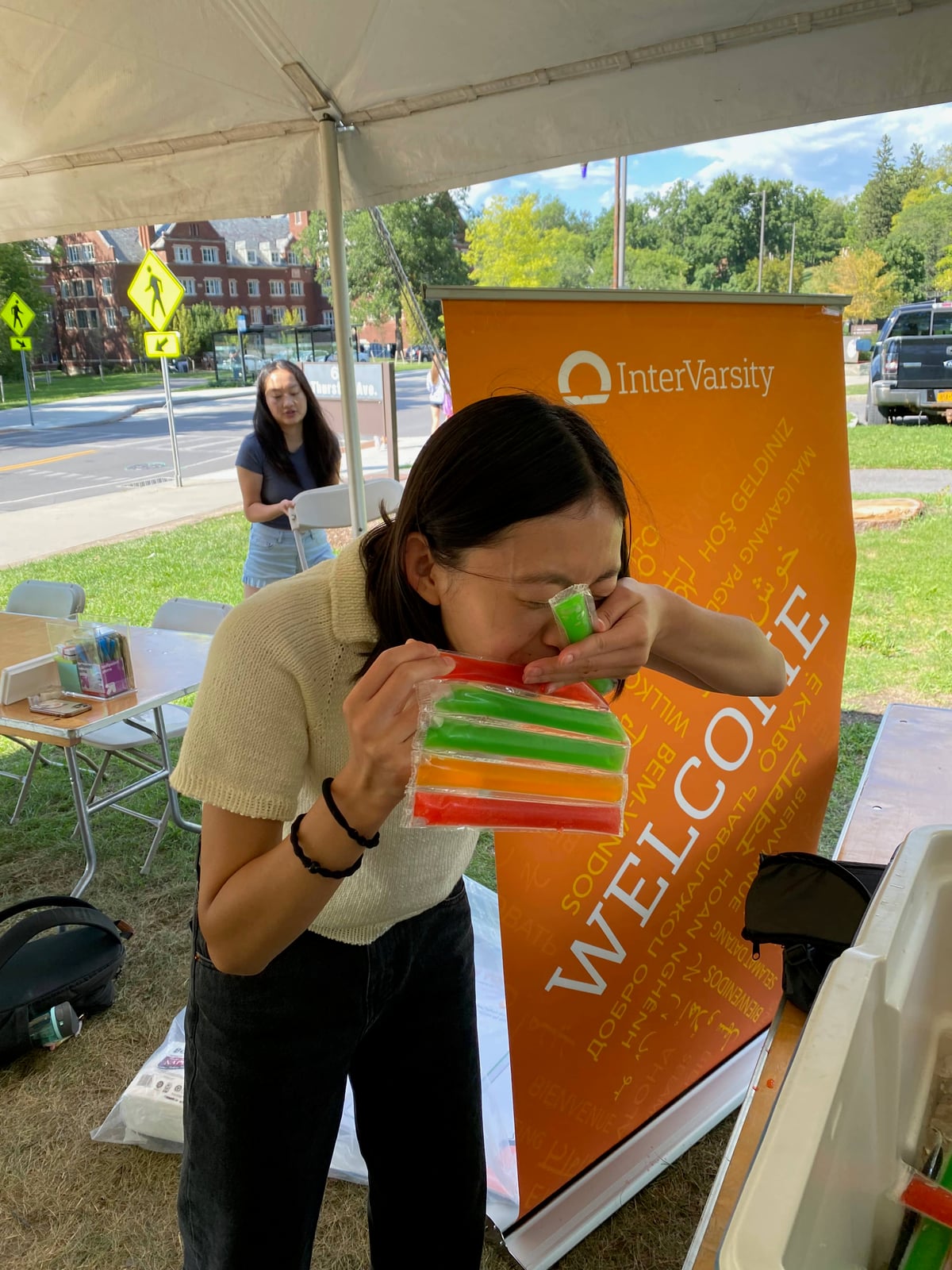 Melody eats the ice pops